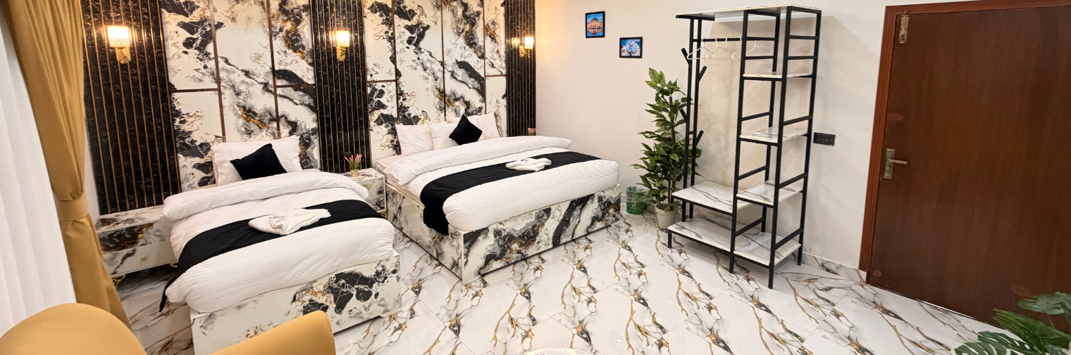 A Hotel Room With A Cozy Bed And Photo Pillow at The Muse New York