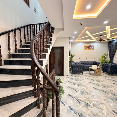 Enjoying A Moment Of Relaxation And Taking In The View Outside at The Decent Luxury Guest House